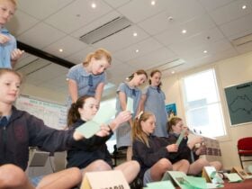 Students counting votes in a mock election
