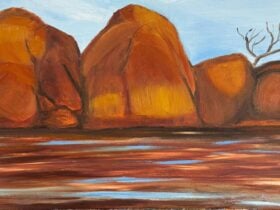 A painting of orange rocks