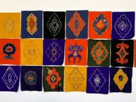 A collection of vibrant textile artworks with a combination of symbols.