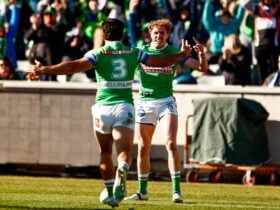 Canberra Raiders player Jed Stuart celebrating a try.