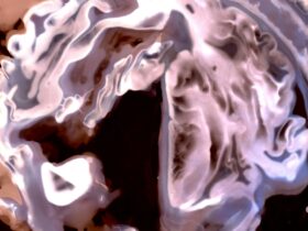 An abstract image of light pink squiggles