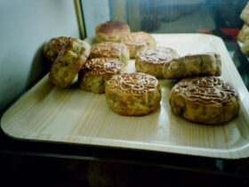 A photograph of mooncakes sitting on a tray