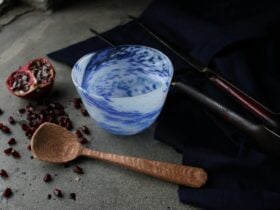 hand carved wooden spoon, and blown bowl