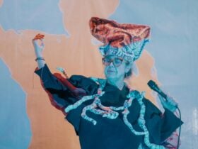 a photo of a woman holding a microphone dancing