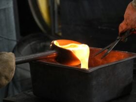 sandcasting ladle of hot glass