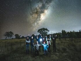 Portrait of photographers under the Milky Way