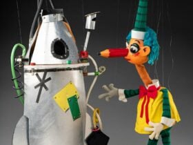 A puppet of a rocket ship and Mr Squiggle