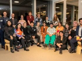 A large group of people posing for a photograph