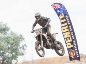 A rider jumping through the air