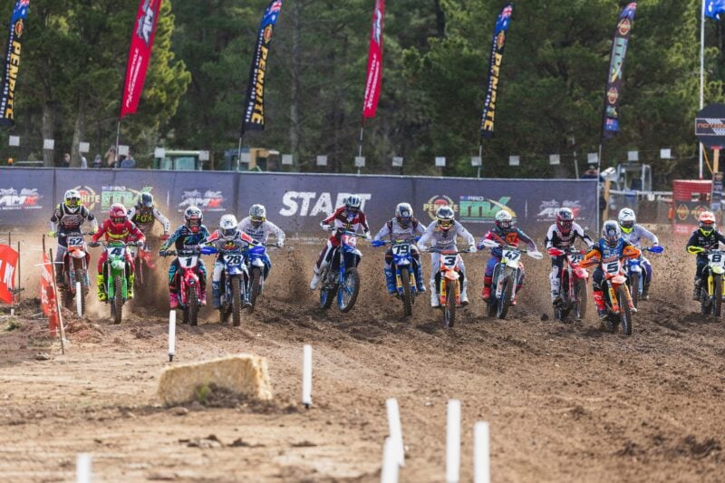 A pack of riders take off from the ProMX MX1 start line