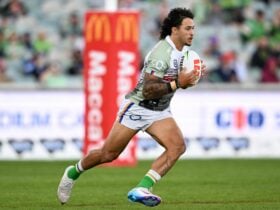 Canberra Raiders player Xavier Savage running the ball.
