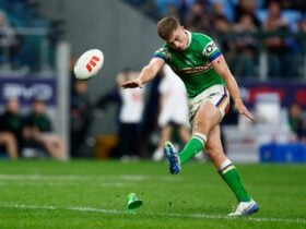 Canberra Raiders player Ethan Sanders kicking a conversion.