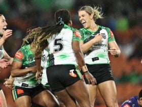 Raiders NRLW player Jordyn Preston celebrating a try.