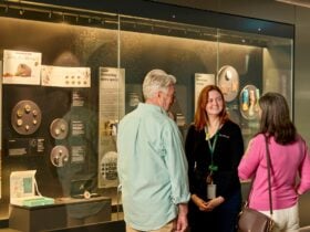 Couple on a free guided tour at the Mint