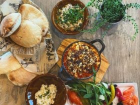 Spread of Lebanese food on wooden table