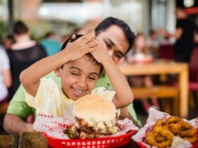 Father and son enjoying their meal
