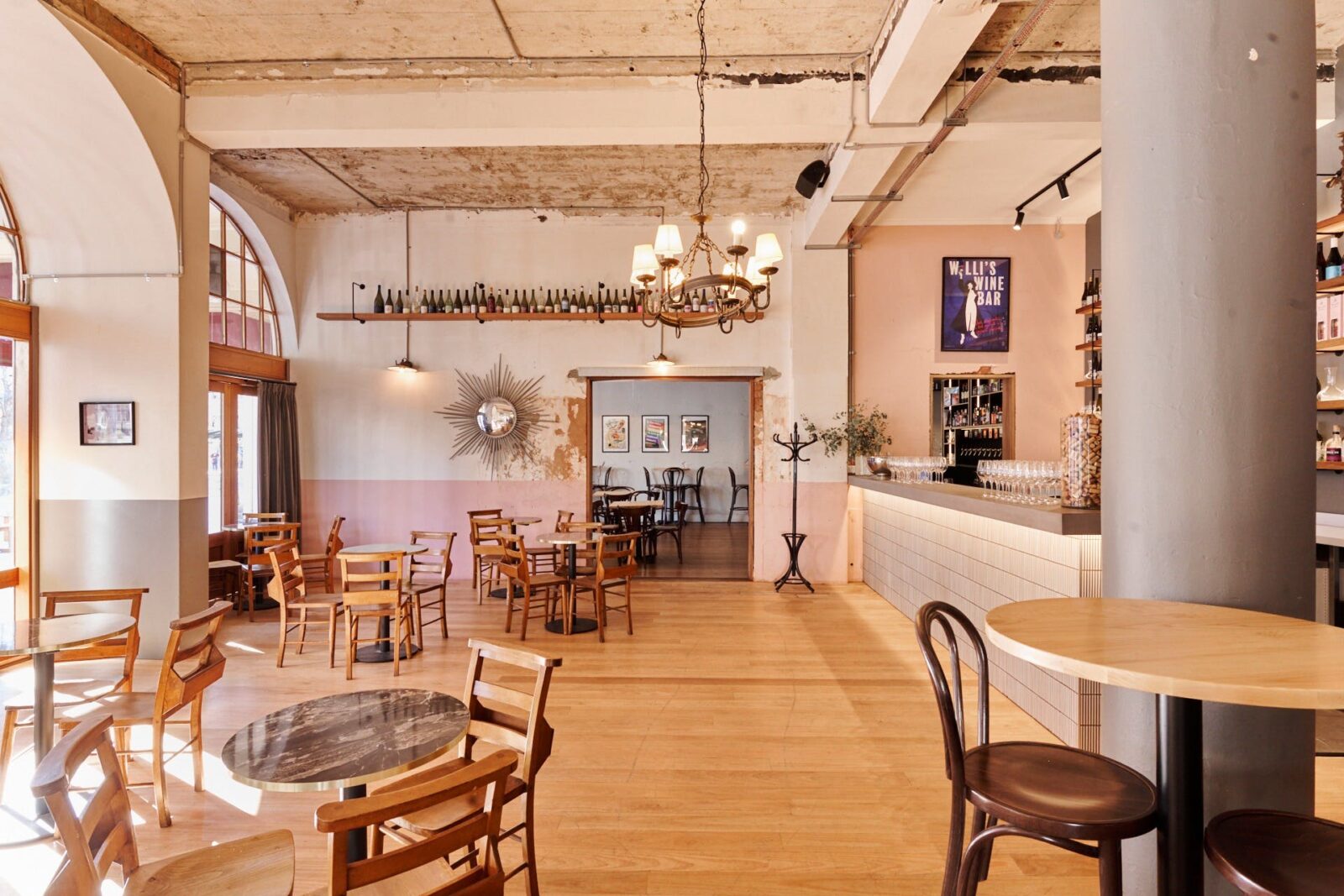 Room with tables and chairs and natural light from sun