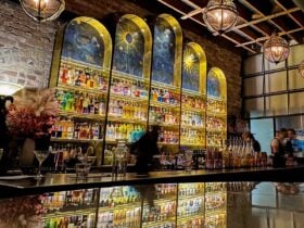 Beautiful decorative shelves behind bar