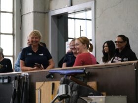 Visitors being shown around the Glassworks Engine Room