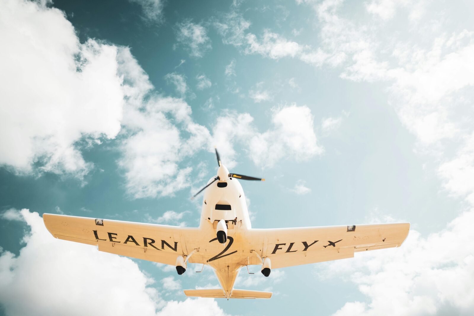 Learn2Fly aircraft photo from below pictured coming into land