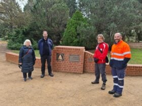Rotarians at English Garden wall
