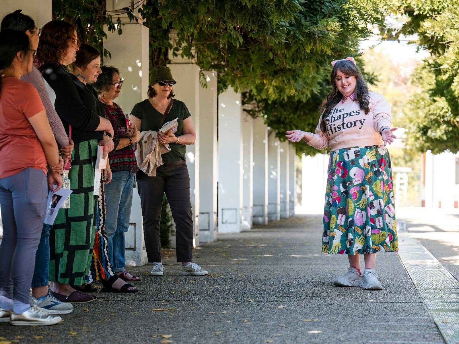 Local guide in Canberra walking with group
