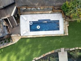 Aerial image of swimming pool with two pool rings floating