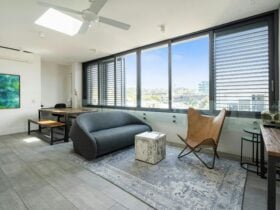 Bright, open-plan living area with natural light and minimalist decor.