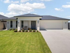 Large driveway and modern exterior