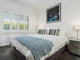 Queen bed at the front bedroom