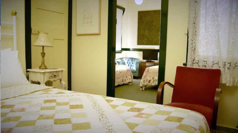 Queen bed and two single beds