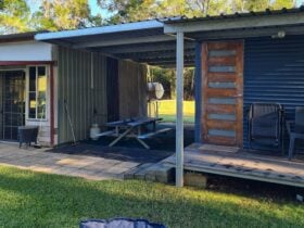Cabin and camp kitchen are located ideally next to each other, with indoor and outdoor seating options availble