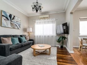 Sofa, tv and coffee table in the lounge room.