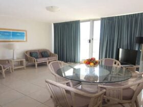 Lounge and dining with 4 seater dining setting