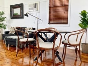 lounge and dining combined with reading lamps and smart TV