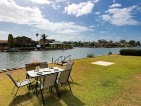 Outdoor dining area on the lakefront lawn