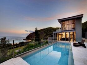 Inviting swimming pool with scenic views, visible from the house