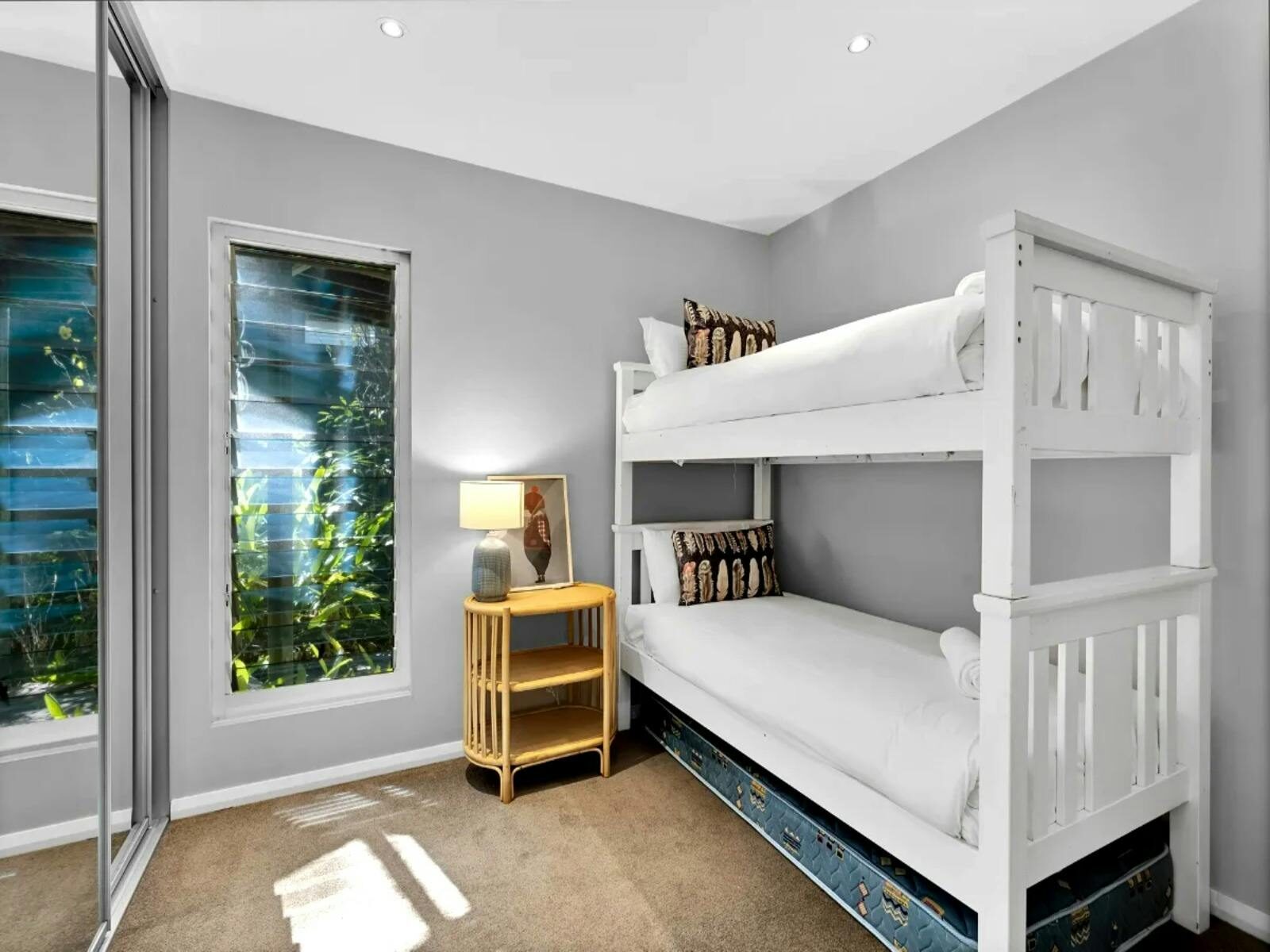 Stylish bunk bedroom with modern design elements