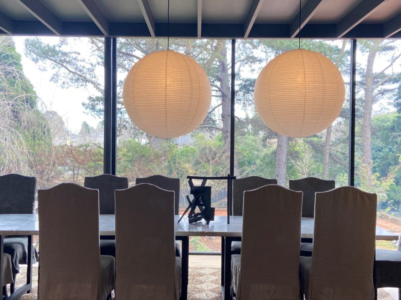 Stunning dining room in a modern glass pavillion