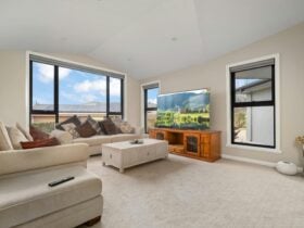 Comfortable living room with lots of room and a tv