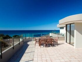 Terrace with outdoor setting and stunning ocean views