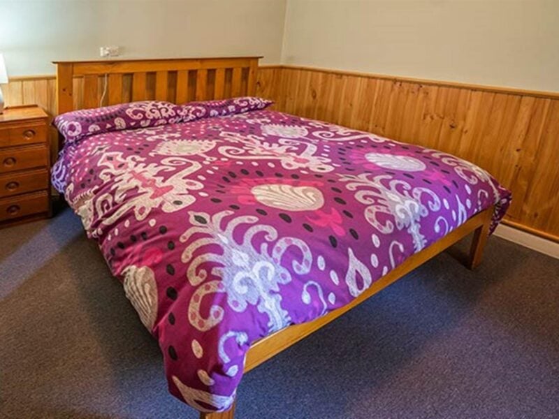 Main bedroom at Post Office Cottage in Wombeyan Karst Conservation Reserve. Photo: OEH/John Spencer