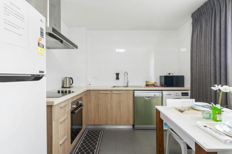 Kitchen & Laundry in Self-Contained Studio Apartment