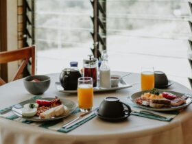 a freshly cooked English Breakfast, juice, tea and coffee with table service in dining room