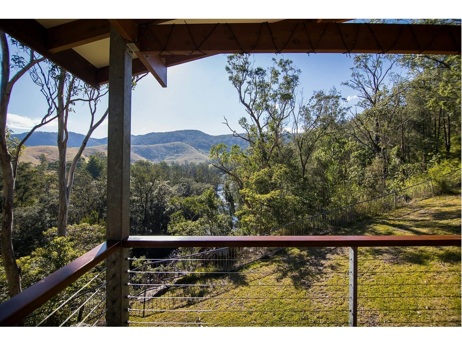 View of river and mountains from balcony