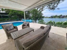 View from suite door across river & pool