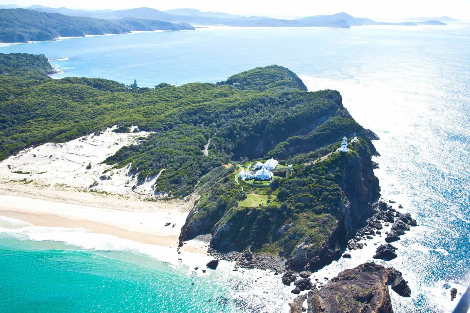Exquisite aerial of Sugarloaf Point with keepers