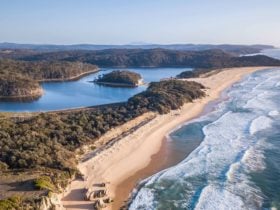 Walk to a stunning beach from Tanja lagoon camp