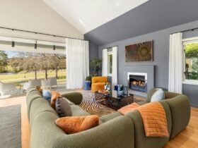 The Lake House lounge room with fireplace