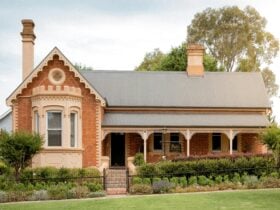 Heritage listed brick home with a cottage garden